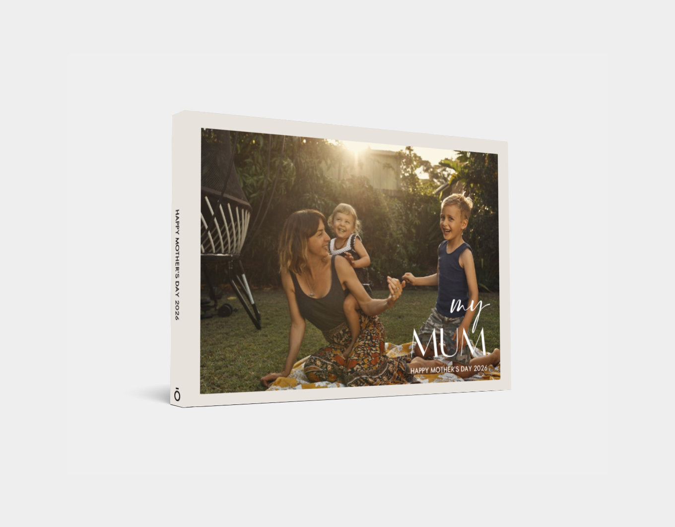 Product packaging with a photo of a woman and two children outdoors featuring the brand mom